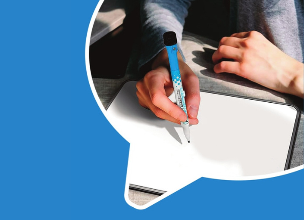 A screenshot from the resource, "Using mini whiteboards in the MFL classroom". It shows a hand holding a pen, about to write on a miniature whiteboard.